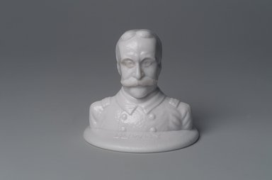 American. <em>Bust of Admiral George Dewey</em>, 1899. Glass, 3 1/2 x 3 7/8 x 3 7/8 in. (8.9 x 9.8 x 9.8 cm). Brooklyn Museum, Gift of Mrs. William Greig Walker by subscription, 40.266. Creative Commons-BY (Photo: Brooklyn Museum, 40.266.jpg)