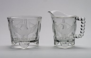 American. <em>Cream Pitcher or Creamer</em>, ca. 1898. Glass, 4 1/2 x 5 1/4 x 3 3/8 in. (11.4 x 13.3 x 8.6 cm). Brooklyn Museum, Gift of Mrs. V. B. Howe, 40.377.2. Creative Commons-BY (Photo: , 40.377.1_40.377.2.jpg)