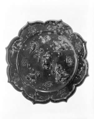  <em>Mirror</em>, 618-906 C.E. Bronze, diameter: 7 5/8 in. (19.3). Brooklyn Museum, 40.717. Creative Commons-BY (Photo: Brooklyn Museum, 40.717_bw.jpg)
