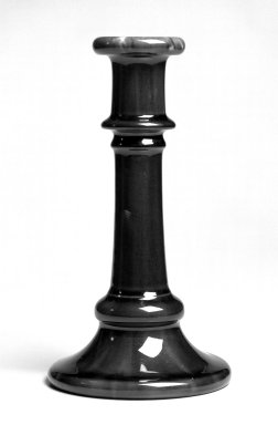  <em>Candlestick</em>, Circa 1850. Earthenware, 7 3/4 x 4 1/4 in. (19.7 x 10.8 cm). Brooklyn Museum, Gift of Arthur W. Clement, 41.111. Creative Commons-BY (Photo: Brooklyn Museum, 41.111_bw.jpg)