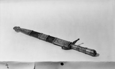  <em>Cowboy's Knife in Sheath</em>, circa 1800. Silver, leather, 1 9/16 × 18 1/2 in. (4 × 47 cm). Brooklyn Museum, Museum Expedition 1941, Frank L. Babbott Fund, 41.1273.33a-b. Creative Commons-BY (Photo: Brooklyn Museum, 41.1273.33a-b_acetate_bw.jpg)