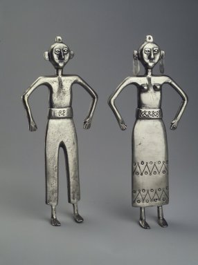 Mapuche. <em>Two Figurines, Male and Female</em>, 19th century. Silver, a: 7 7/8 x 3 1/2 x 11/16 in. (20 x 8.9 x 1.7 cm). Brooklyn Museum, Museum Expedition 1941, Frank L. Babbott Fund, 41.1274.9a-b. Creative Commons-BY (Photo: Brooklyn Museum, 41.1274.9.jpg)