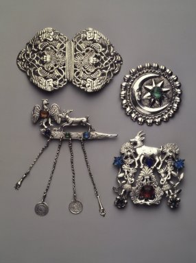  <em>Circular Pin</em>. Silver, 3 1/4 x 3 1/4 in. Brooklyn Museum, Museum Expedition 1941, Frank L. Babbott Fund, 41.1275.268. Creative Commons-BY (Photo: Brooklyn Museum, 41.1275.268_41.1275.259a-b_41.1308.12_41.1308.14.jpg)
