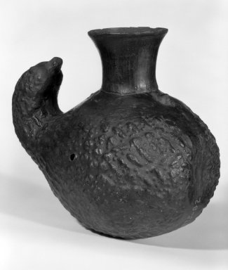 Chimú. <em>Jar in the Form of a Squash</em>, probably 20th century. Ceramic, 7 1/2 x 8 1/2 x 5 1/2 in. (19.1 x 21.6 x 14 cm). Brooklyn Museum, Museum Expedition 1941, Frank L. Babbott Fund, 41.1275.82. Creative Commons-BY (Photo: Brooklyn Museum, 41.1275.82_bw.jpg)