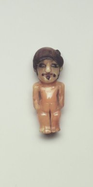 Nazca. <em>Small Standing Figurine</em>, 300-700. Ivory, shell, resin, 1 3/4 x 3/4 x 11/16 in. (4.4 x 1.9 x 1.7 cm). Brooklyn Museum, A. Augustus Healy Fund, 41.231. Creative Commons-BY (Photo: Brooklyn Museum, 41.231.jpg)