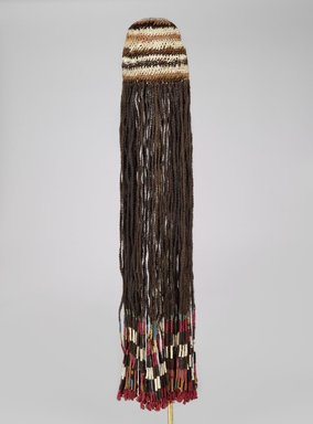 Coastal Wari. <em>Wig Headdress</em>, 600-1000. Cotton, camelid fiber, human hair, bast fiber, 35 13/16 x 8 3/4 x 2 1/2 in. (91 x 22.2 x 6.4 cm). Brooklyn Museum, Henry L. Batterman Fund, 41.427. Creative Commons-BY (Photo: Brooklyn Museum, 41.427_PS6.jpg)