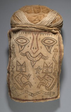 Paracas Ocucaje. <em>False Head for Burial Bundle or Mummy Mask</em>, 100 B.C.E. - 1 C.E. Cotton, pigments, 13 1/2 x 7 1/4 x 3 in. (34.3 x 18.4 x 7.6 cm). Brooklyn Museum, Henry L. Batterman Fund, 41.428. Creative Commons-BY (Photo: Brooklyn Museum, 41.428_PS6.jpg)