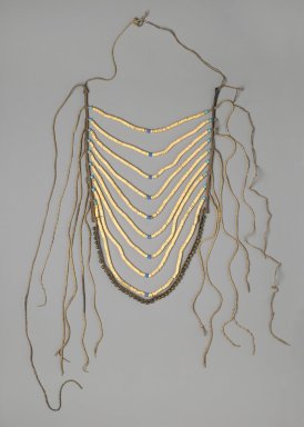 Crow. <em>Man's Breastplate</em>, 1880-1900. Shell, glass beads, commercial leather, brass, twine, 18 1/2 x 11 7/16 in. (47 x 29.1 cm). Brooklyn Museum, By exchange, 41.863. Creative Commons-BY (Photo: Brooklyn Museum, 41.863_PS2.jpg)