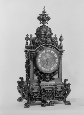 Unknown. <em>Clock, Part of a Three Piece Garniture</em>, ca. 1881. Brass, 30 1/2 x 15 x 11 1/2 in. (77.5 x 38.1 x 29.2 cm). Brooklyn Museum, Gift of Mrs. William E. S. Griswold in memory of her father, John Sloane, 41.980.17.1. Creative Commons-BY (Photo: Brooklyn Museum, 41.980.17.1_bw.jpg)