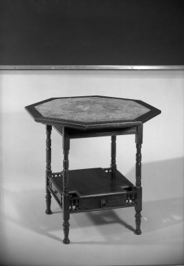 Herter Brothers (American, 1865–1905). <em>Center Table</em>, ca. 1881. Mahogany, inlay of various woods, brass, textile, 26 1/2 x 28 1/2 in. (67.3 x 72.4 cm). Brooklyn Museum, Gift of Mrs. William E. S. Griswold in memory of her father, John Sloane, 41.980.8. Creative Commons-BY (Photo: Brooklyn Museum, 41.980.8_acetate_bw.jpg)