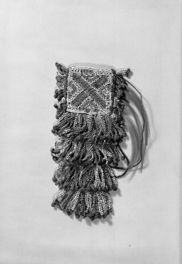 Bagobo. <em>Ornament</em>. Cotton, veg. fiber, glass beads, metal sequins, yellow metal,   animal hair Brooklyn Museum, By exchange, 42.111.20. Creative Commons-BY (Photo: Brooklyn Museum, 42.111.20_acetate_bw.jpg)