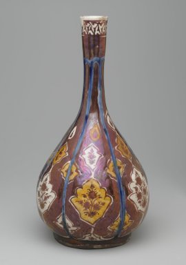 <em>Lobed Pear-Shaped Bottle with Floral Escutcheons</em>, 17th century. Ceramic; fritware, painted in cobalt blue and red (copper) and yellow (silver) luster on an opaque white glaze, 12 3/16 x 6 5/16 in. (31 x 16 cm). Brooklyn Museum, Gift of Mrs. Horace O. Havemeyer, 42.212.14. Creative Commons-BY (Photo: Brooklyn Museum, 42.212.14_side1_PS2.jpg)
