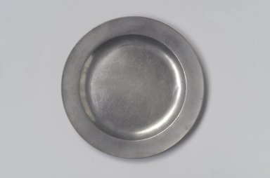 American. <em>Plate</em>, 1760–1790. Pewter, 5/8 x 8 7/8 x 8 7/8 in. (1.6 x 22.5 x 22.5 cm). Brooklyn Museum, Anonymous gift, 42.278.5. Creative Commons-BY (Photo: Brooklyn Museum, 42.278.5.jpg)