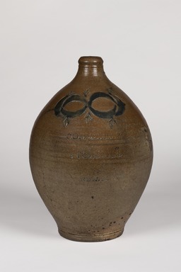 Thomas W. Commeraw (American, active first quarter 19th century). <em>Jug</em>, early 19th century. Earthenware, 15 × 10 × 10 in. (38.1 × 25.4 × 25.4 cm). Brooklyn Museum, Gift of Arthur W. Clement, 43.128.12. Creative Commons-BY (Photo: Brooklyn Museum, 43.128.12_front_PS22.jpg)