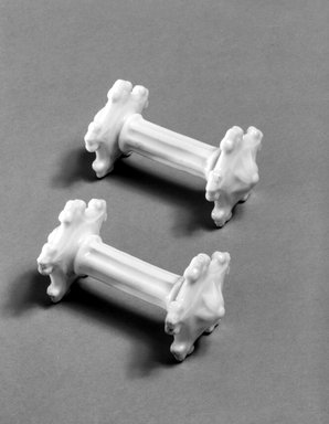 Attributed to Charles Cartlidge & Co. (1848–1856). <em>Pair of Knife Rests</em>, 1848–1856. Porcelain, each: 1 7/8 x 3 1/2 x 2 in. (4.8 x 8.9 x 5.1 cm). Brooklyn Museum, Gift of Arthur W. Clement, 43.128.143a-b. Creative Commons-BY (Photo: Brooklyn Museum, 43.128.143_bw.jpg)