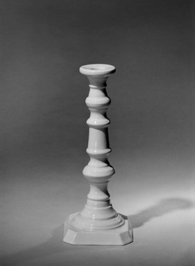 attributed to Charles Cartlidge & Co. (1848–1856). <em>Candlestick</em>, mid–19th century. Porcelain, 9 1/4 x 3 7/8 in. (23.5 x 9.8 cm). Brooklyn Museum, Gift of Arthur W. Clement, 43.128.200. Creative Commons-BY (Photo: Brooklyn Museum, 43.128.200_bw.jpg)