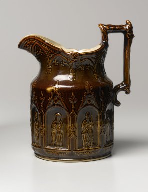 American Pottery Company (1833-ca 1854). <em>Pitcher, "Apostle's Pitcher,"</em> after 1842. Glazed Earthenware, 9 1/4 in. (23.5 cm). Brooklyn Museum, Gift of Arthur W. Clement, 43.128.27. Creative Commons-BY (Photo: Brooklyn Museum, 43.128.27_PS1.jpg)