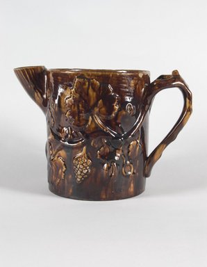 Abraham Cadmus. <em>Batter Pot</em>, circa 1880. Earthenware, 7 1/2 in. (19 cm). Brooklyn Museum, Gift of Arthur W. Clement, 43.128.29. Creative Commons-BY (Photo: Brooklyn Museum, 43.128.29_PS5.jpg)