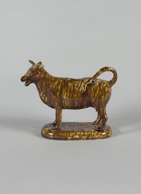  <em>Cow Creamer</em>, 1852-1858. Earthenware, 5 1/2 × 7 in. (14 × 17.8 cm). Brooklyn Museum, Gift of Arthur W. Clement, 43.128.35. Creative Commons-BY (Photo: Brooklyn Museum, 43.128.35_PS5.jpg)