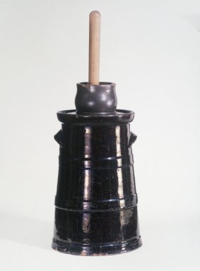 American. <em>Churn with Cover and Dasher</em>, mid-19th century. Earthenware and wood, 13 3/4 in. (34.9 cm). Brooklyn Museum, Gift of Arthur W. Clement, 43.128.83. Creative Commons-BY (Photo: Brooklyn Museum, 43.128.83.jpg)