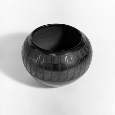 Maria Martinez (ca. 1887-1980). <em>Bowl</em>, ca. 1943. Clay, slip, 5 1/2 x 7 1/2 in. (14 x 19.1 cm). Brooklyn Museum, Anonymous gift in memory of Dr. Harlow Brooks, 43.201.197. Creative Commons-BY (Photo: Brooklyn Museum, 43.201.197_bw.jpg)