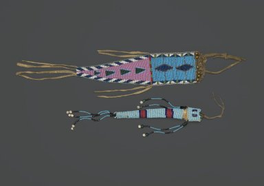 Plains (Northern). <em>Awl Case</em>, early 19th century. Hide, beads, 11 1/4 x 2 3/4 in. (28.6 x 7 cm). Brooklyn Museum, Henry L. Batterman Fund and the Frank Sherman Benson Fund, 50.67.36. Creative Commons-BY (Photo: , 43.201.25_50.67.36_PS1.jpg)