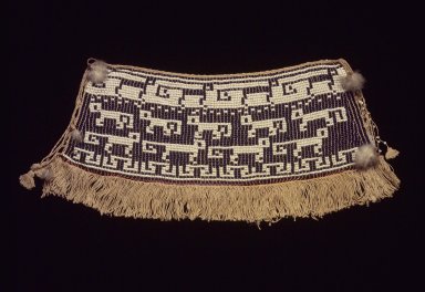 Arawak. <em>Woman's Apron</em>, early 20th century. Cotton, glass beads, feathers, 8 1/4 × 19 1/8 × 1/4 in. (21 × 48.6 × 0.6 cm). Brooklyn Museum, Anonymous gift in memory of Dr. Harlow Brooks, 43.201.33. Creative Commons-BY (Photo: Brooklyn Museum, 43.201.33.jpg)