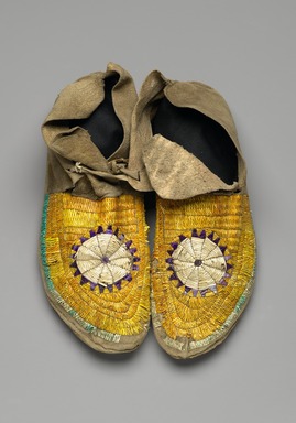 Sioux. <em>Pair of Moccasins</em>, ca. 1882. Hide, porcupine twill, 10 7/16 x 3 15/16 in. (26.5 x 10 cm). Brooklyn Museum, Anonymous gift in memory of Dr. Harlow Brooks, 43.201.66a-b. Creative Commons-BY (Photo: Brooklyn Museum, 43.201.66a-b_view1_PS2.jpg)