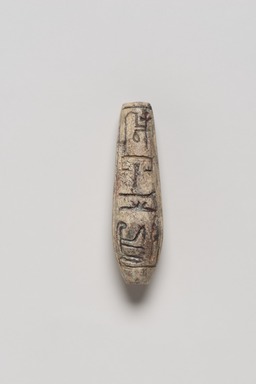  <em>Bead Inscribed for Treasurer Huy</em>, ca. 1479-1390 B.C.E. Steatite, glaze, 3/8 x 1 5/16 in. (1 x 3.3 cm). Brooklyn Museum, Charles Edwin Wilbour Fund, 44.123.144. Creative Commons-BY (Photo: Brooklyn Museum, 44.123.144_PS20.jpg)