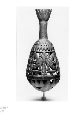  <em>Bottle with Openwork Shell</em>, ca. 1075-712 B.C.E. Egyptian blue, 6 11/16 x greatest diam. 2 15/16 in. (17 x 7.5 cm). Brooklyn Museum, Charles Edwin Wilbour Fund, 44.175. Creative Commons-BY (Photo: Brooklyn Museum, 44.175_NegA_print_SL4.jpg)