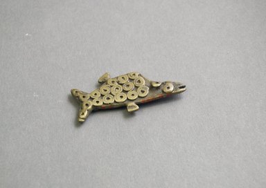 Akan. <em>Gold-weight (abrammuo): fish</em>, late 19th-mid 20th century. Bronze, 1 1/16 x 2 3/16 in. (2.7 x 5.5 cm). Brooklyn Museum, A. Augustus Healy Fund, 44.231.20. Creative Commons-BY (Photo: Brooklyn Museum, 44.231.20_front_PS5.jpg)