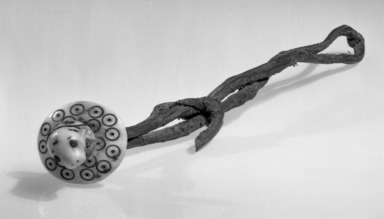 Inupiaq. <em>Drag with ivory seal-head toggle</em>, late 19th century. Hide, ivory, toggle width: 1 1/2 in. (3.8 cm). Brooklyn Museum, A. Augustus Healy Fund, 44.34.11. Creative Commons-BY (Photo: Brooklyn Museum, 44.34.11_acetate_bw.jpg)