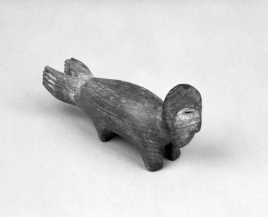 Native Alaskan. <em>Carving of a Seal with flippers and a Human Head</em>, 19th century (possibly). Wood, 6 1/2 x 3 1/4 x 1 5/8 in. or (8.0 x 16.0 x 3.7 cm). Brooklyn Museum, Henry L. Batterman Fund, 44.4.10. Creative Commons-BY (Photo: Brooklyn Museum, 44.4.10_bw.jpg)