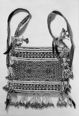  <em>Bag</em>. Vegetable fiber, cotton, glass beads, yellow & white metal bells, animal hair, metal sequins Brooklyn Museum, Henry L. Batterman Fund, 44.4.2. Creative Commons-BY (Photo: Brooklyn Museum, 44.4.2_acetate_bw.jpg)