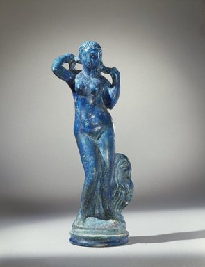  <em>Statuette of Aphrodite Anadyomene</em>, late 2nd century B.C.E. Faience, 14 3/16 x Diam. 4 1/4 in. (36 x 10.8 cm). Brooklyn Museum, Charles Edwin Wilbour Fund, 44.7. Creative Commons-BY (Photo: Brooklyn Museum, 44.7_SL3.jpg)