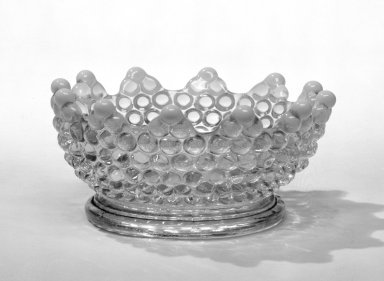 American. <em>Dish</em>, late 19th century. Pressed glass, 2 1/8 x 4 3/4 in. (5.4 x 12.1 cm). Brooklyn Museum, Gift of Arthur W. Clement, 45.1.20. Creative Commons-BY (Photo: Brooklyn Museum, 45.1.20_bw.jpg)