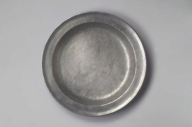 Jacob Eggleston. <em>Plate</em>, 1795-1813. Pewter, 1 1/2 x 13 1/4 x 13 1/4 in. (3.8 x 33.7 x 33.7 cm). Brooklyn Museum, Gift of Arthur W. Clement, 45.1.31. Creative Commons-BY (Photo: Brooklyn Museum, 45.1.31.jpg)