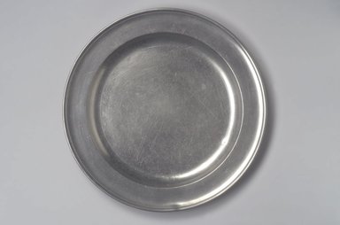 Joseph Danforth. <em>Dish</em>, 1780–1788. Pewter, 3/4 x 12 1/4 x 12 1/4 in. (1.9 x 31.1 x 31.1 cm). Brooklyn Museum, Designated Purchase Fund, 45.10.108. Creative Commons-BY (Photo: Brooklyn Museum, 45.10.108.jpg)