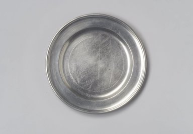 Thomas Danforth II. <em>Plate</em>, ca. 1770–1780. Pewter, 5/8 x 7 15/16 x 7 15/16 in. (1.6 x 20.2 x 20.2 cm). Brooklyn Museum, Designated Purchase Fund, 45.10.120. Creative Commons-BY (Photo: Brooklyn Museum, 45.10.120.jpg)