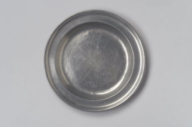 Frederick Bassett (American, active 1761-1800). <em>Plate</em>, 1761-1800. Pewter, 3/4 x 8 7/8 x 8 7/8 in. (1.9 x 22.5 x 22.5 cm). Brooklyn Museum, Designated Purchase Fund, 45.10.147. Creative Commons-BY (Photo: Brooklyn Museum, 45.10.147.jpg)