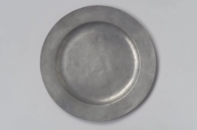 Cornelius Bradford. <em>Plate</em>, 1752–1785. Pewter, 1/2 x 9 7/8 x 9 7/8 in. (1.3 x 25.1 x 25.1 cm). Brooklyn Museum, Designated Purchase Fund, 45.10.164. Creative Commons-BY (Photo: Brooklyn Museum, 45.10.164.jpg)