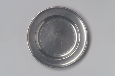 Thomas Danforth III (American, 1756-1840). <em>Plate</em>, 1777-1818. Pewter, 5/8 x 7 3/4 x 7 3/4 in. (1.6 x 19.7 x 19.7 cm). Brooklyn Museum, Designated Purchase Fund, 45.10.179. Creative Commons-BY (Photo: Brooklyn Museum, 45.10.179.jpg)