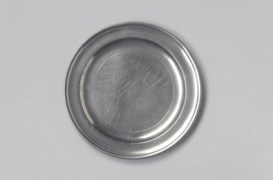 Richard Austin. <em>Plate</em>, 1793–1817. Pewter, 5/8 x 8 1/2 x 8 1/2 in. (1.6 x 21.6 x 21.6 cm). Brooklyn Museum, Designated Purchase Fund, 45.10.19. Creative Commons-BY (Photo: Brooklyn Museum, 45.10.19.jpg)