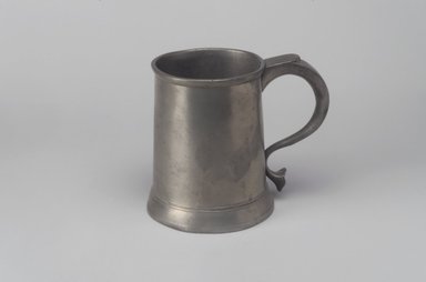 Possibly John Skinner. <em>Pint Mug</em>, 18th century. Pewter, 4 3/4 x 5 5/8 x 3 7/8 in. (12.1 x 14.3 x 9.8 cm). Brooklyn Museum, Designated Purchase Fund, 45.10.203. Creative Commons-BY (Photo: Brooklyn Museum, 45.10.203.jpg)