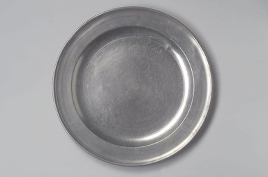 Richard Austin. <em>Dish</em>, 1793–1817. Pewter, 1 1/8 x 14 7/8 x 14 7/8 in. (2.9 x 37.8 x 37.8 cm). Brooklyn Museum, Designated Purchase Fund, 45.10.21. Creative Commons-BY (Photo: Brooklyn Museum, 45.10.21.jpg)