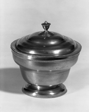 Parks Boyd. <em>Covered Sugar Bowl</em>, 1795-1819. Pewter, 5 1/4 x 4 7/16 in. (13.3 x 11.3 cm). Brooklyn Museum, Designated Purchase Fund, 45.10.211. Creative Commons-BY (Photo: Brooklyn Museum, 45.10.211_acetate_bw.jpg)