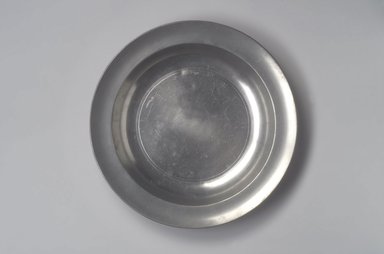  <em>Dish, with Unidentified "Love" Touch</em>, 18th century. Pewter, 1 5/8 x 13 x 13 in. (4.1 x 33 x 33 cm). Brooklyn Museum, Designated Purchase Fund, 45.10.222. Creative Commons-BY (Photo: Brooklyn Museum, 45.10.222.jpg)