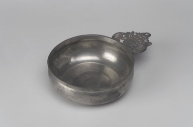 Unknown. <em>Porringer, Unidentified "I.G." Touch</em>, probably late 18th-early 19th century. Pewter, 1 3/4 x 7 3/8 x 5 in. (4.4 x 18.7 x 12.7 cm). Brooklyn Museum, Designated Purchase Fund, 45.10.230. Creative Commons-BY (Photo: Brooklyn Museum, 45.10.230.jpg)
