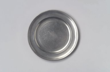 Samuel Pierce. <em>Plate</em>, 1792–1830. Pewter, 5/8 x 7 7/8 x 7 7/8 in. (1.6 x 20 x 20 cm). Brooklyn Museum, Designated Purchase Fund, 45.10.24. Creative Commons-BY (Photo: Brooklyn Museum, 45.10.24.jpg)