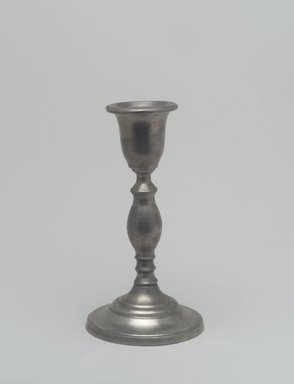 Morey and Smith. <em>Candlestick (One of a Pair)</em>, 1857-1860. Pewter, 7 1/4 x 3 7/8 x 3 7/8 in. (18.4 x 9.8 x 9.8 cm). Brooklyn Museum, Designated Purchase Fund, 45.10.28. Creative Commons-BY (Photo: Brooklyn Museum, 45.10.28.jpg)